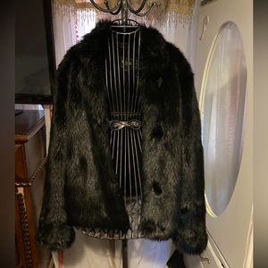Soft and plush black faux fur coat by Oliver Paris